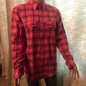 Pink plaid shirt.